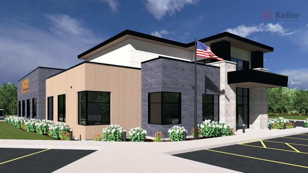 Exterior view of a modern commercial building with mixed siding, an American flag, and landscaping